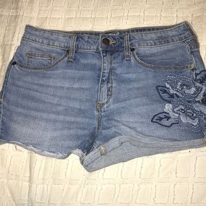 Mid-rise, light-wash jean shorts with embroidery